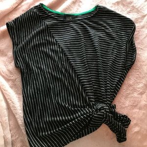 Black and white striped tie in front top.